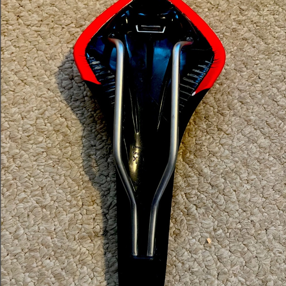 Red and Black Bicycle Saddle